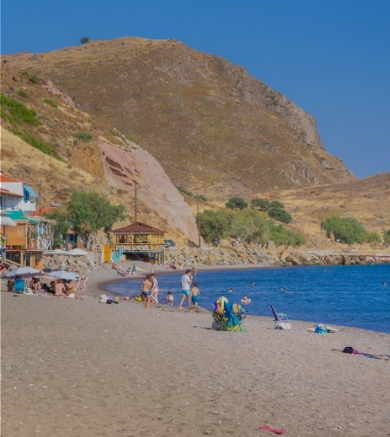 Skala Eressos dark sand beach facing west Lesvos sunset
